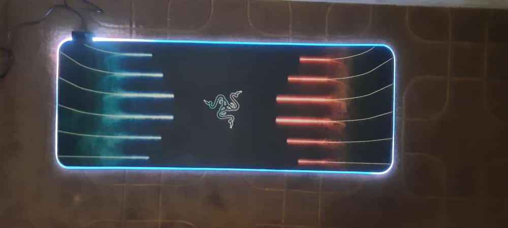 Razer RGB Gaming Mouse Pad lit up on desk
