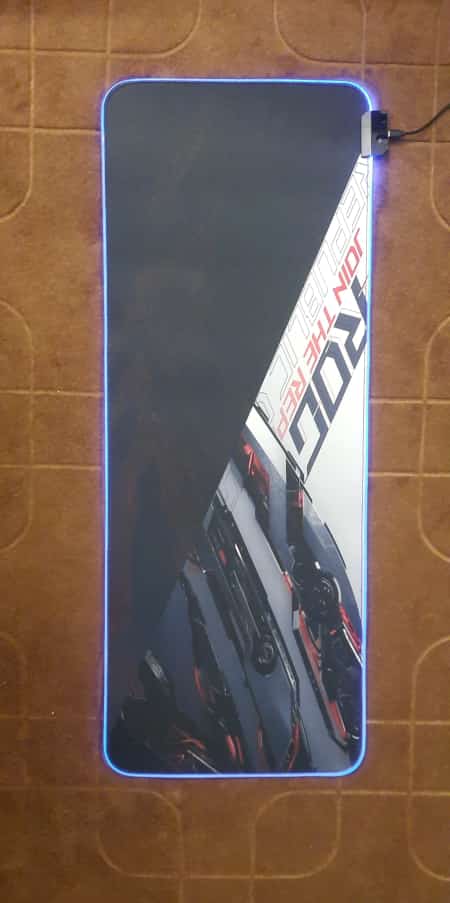ROG Mecha Red Gaming Mouse Pad lit up on desk