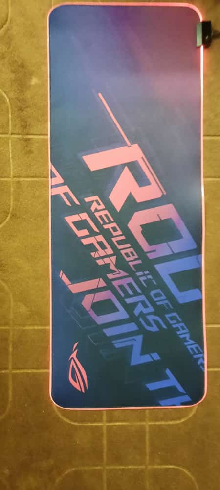 ROG Republic of Gamers Mouse Pad lit up on desk